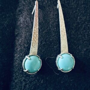 Silver earrings with turquoise round stone